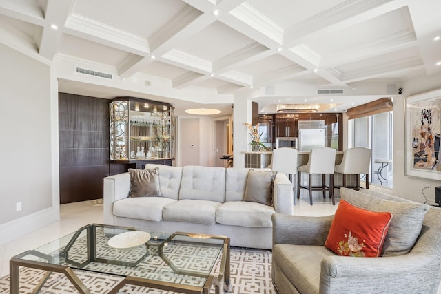 tiled living room with beam ceiling, bar, coffered ceiling, and ornamental molding