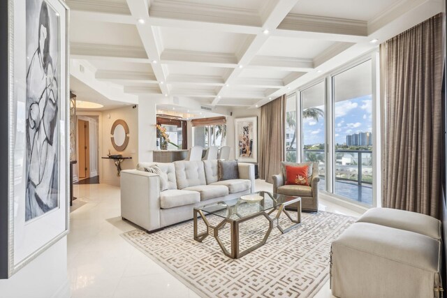 living room with plenty of natural light, beam ceiling, ornamental molding, and coffered ceiling