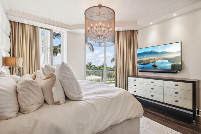 bedroom featuring a notable chandelier, dark hardwood / wood-style floors, and ornamental molding