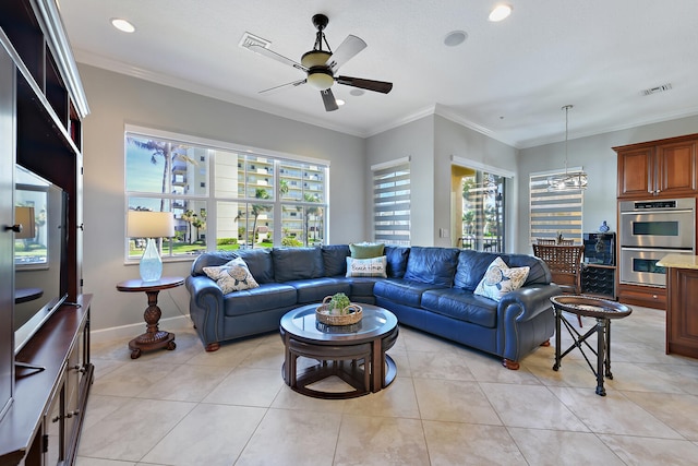 tiled living room featuring crown molding and ceiling fan