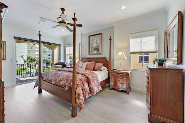 bedroom featuring access to exterior, light hardwood / wood-style floors, multiple windows, and ceiling fan