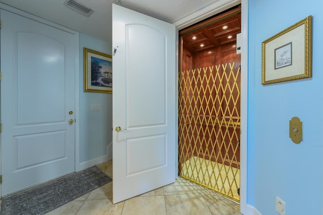 interior space featuring tile patterned flooring