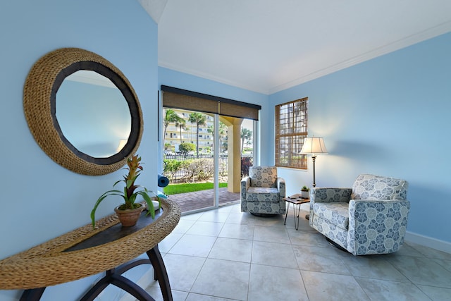 living area featuring light tile patterned floors and ornamental molding