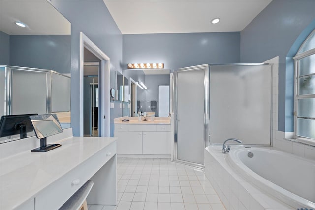 bathroom featuring tile patterned floors, plenty of natural light, vanity, and shower with separate bathtub