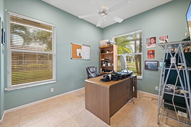 tiled office space with ceiling fan