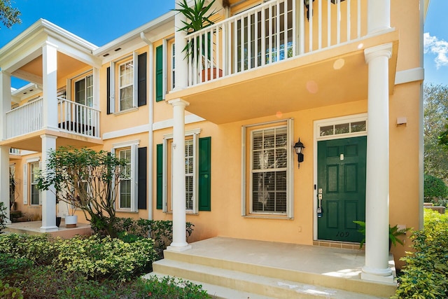 doorway to property with a balcony