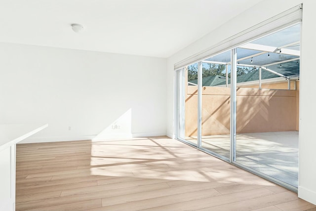 empty room featuring hardwood / wood-style floors