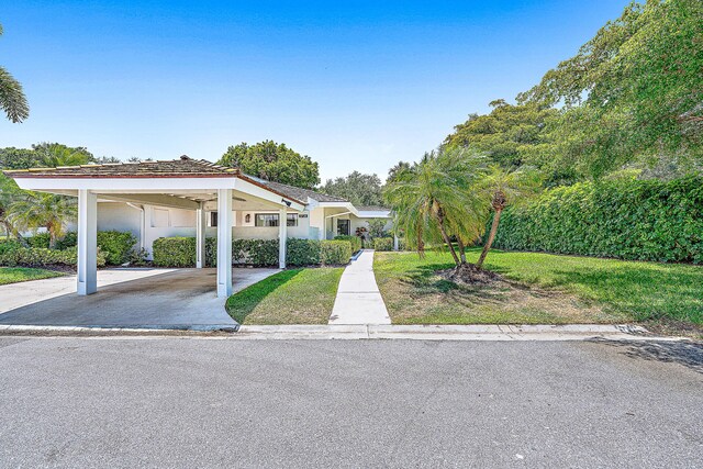 view of front of house with a front lawn