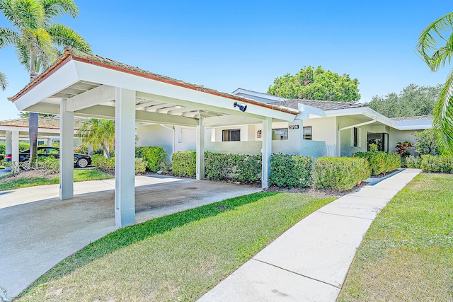 exterior space with a yard