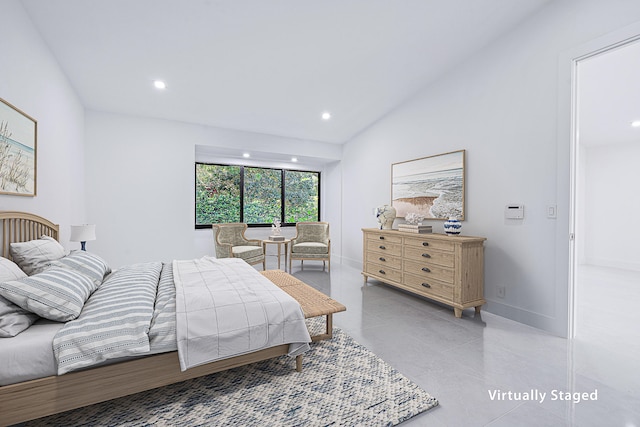 bedroom featuring lofted ceiling