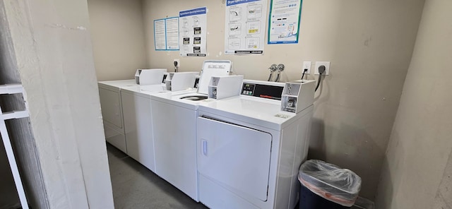 laundry room with independent washer and dryer