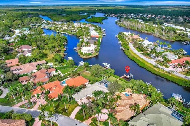 bird's eye view with a water view