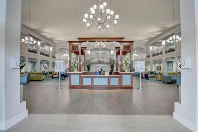 reception area with an inviting chandelier