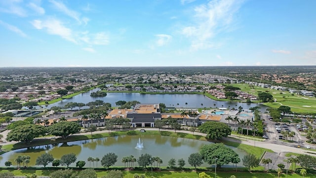 drone / aerial view featuring a water view