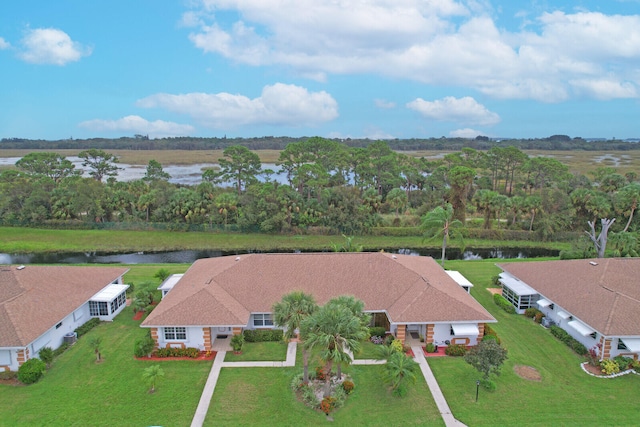 drone / aerial view with a water view