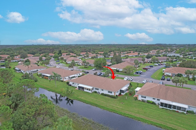 drone / aerial view featuring a water view