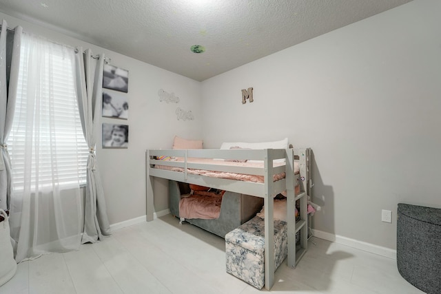 bedroom with a textured ceiling