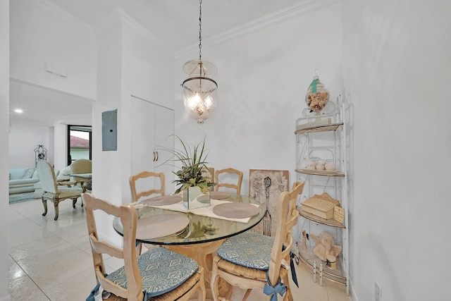 dining area featuring electric panel, light tile patterned floors, a notable chandelier, and ornamental molding