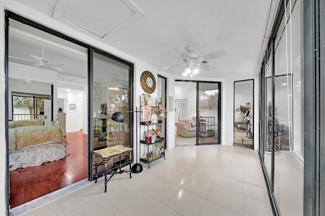 interior space featuring ceiling fan