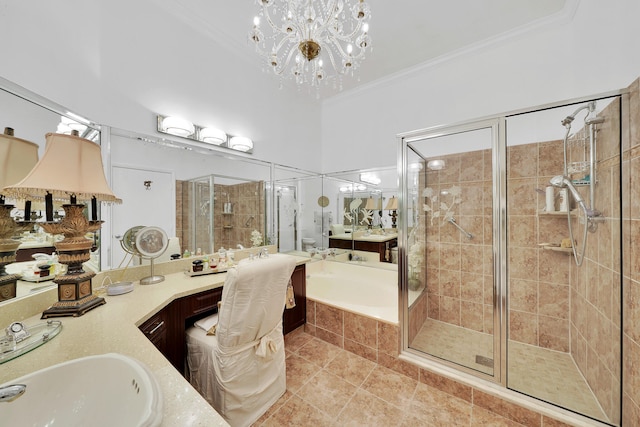 bathroom with vanity, an inviting chandelier, tile patterned flooring, separate shower and tub, and ornamental molding