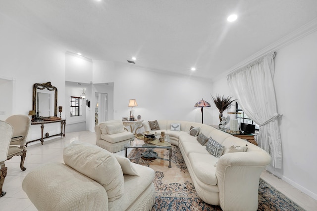 living room featuring light tile patterned floors and crown molding