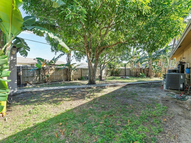 view of yard featuring central AC unit