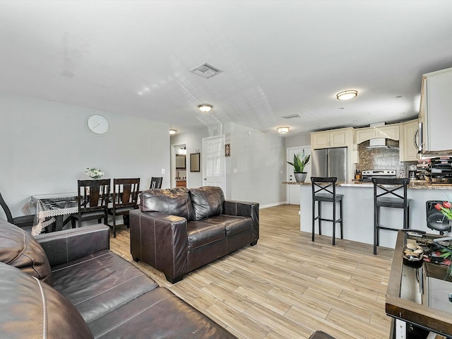 living room featuring light wood-type flooring