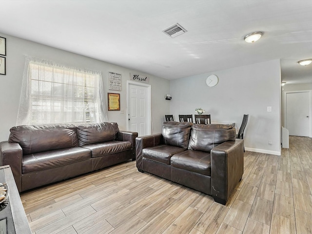 living room featuring light hardwood / wood-style flooring