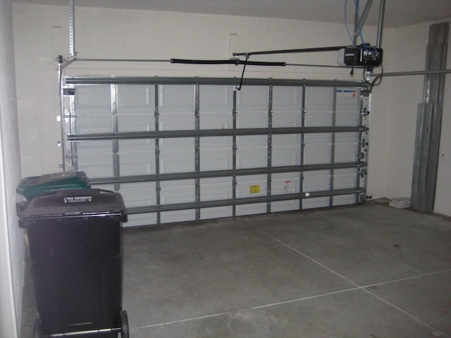 garage featuring a garage door opener