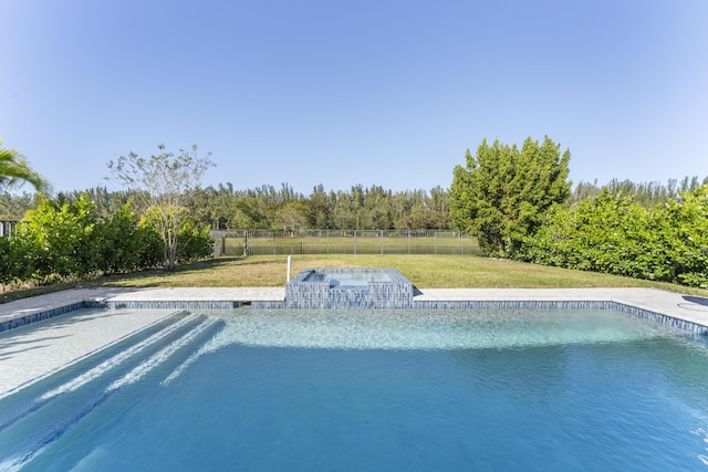 view of pool featuring a yard