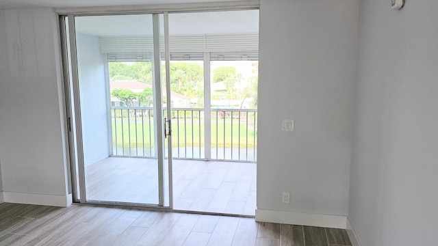 doorway featuring light hardwood / wood-style flooring