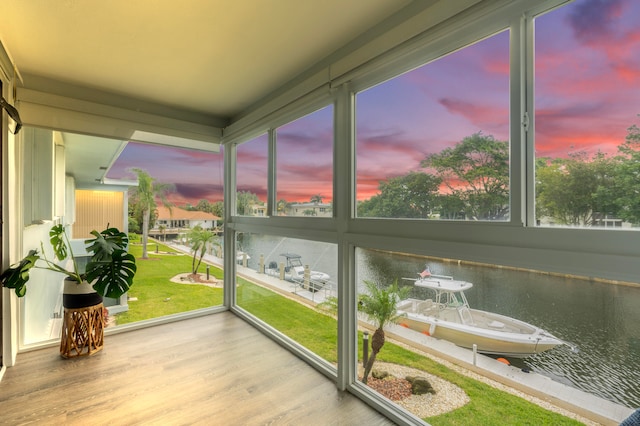 sunroom with a water view