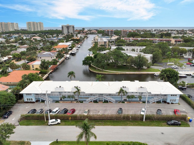 birds eye view of property featuring a water view