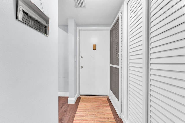 doorway featuring hardwood / wood-style floors