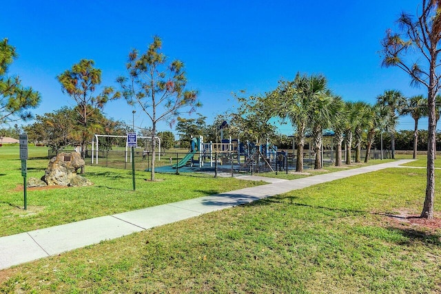 view of community with a playground and a yard