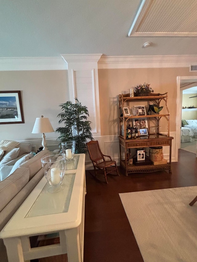 living room with ornamental molding