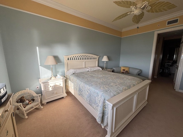 bedroom featuring ceiling fan, crown molding, and light carpet