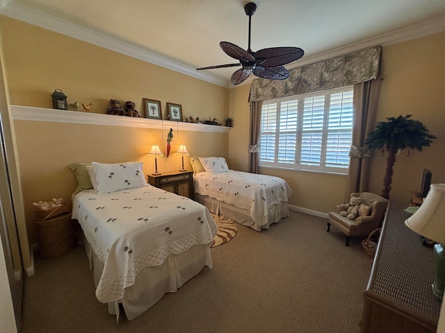 carpeted bedroom featuring ceiling fan and ornamental molding