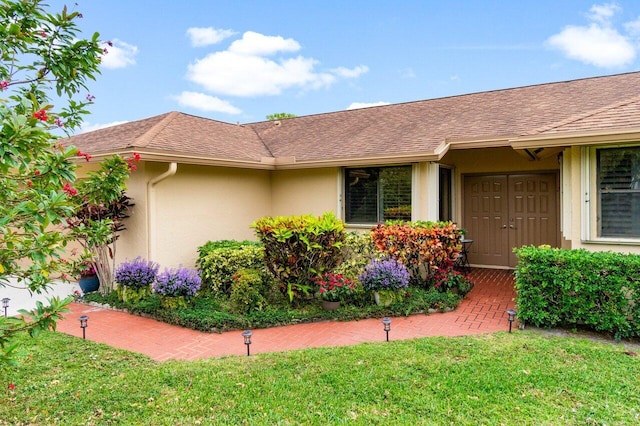 view of home's exterior featuring a yard