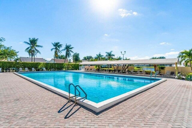 view of pool with a patio area