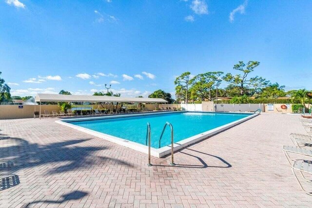 view of pool with a patio area