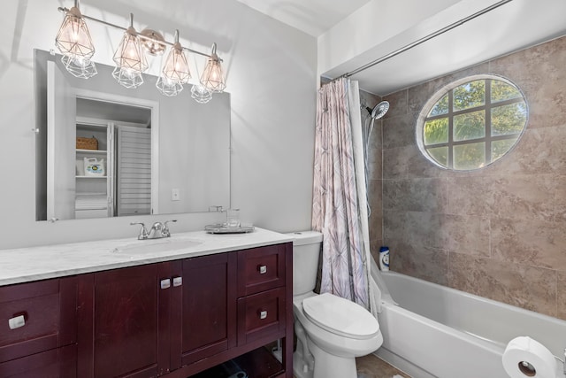 full bathroom featuring vanity, toilet, and shower / bath combo with shower curtain