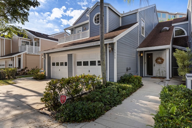 view of front of house with a balcony and a garage