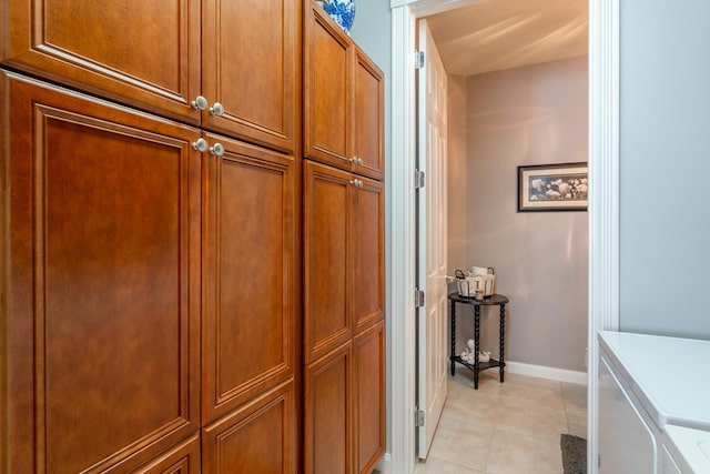 hall with light tile patterned floors