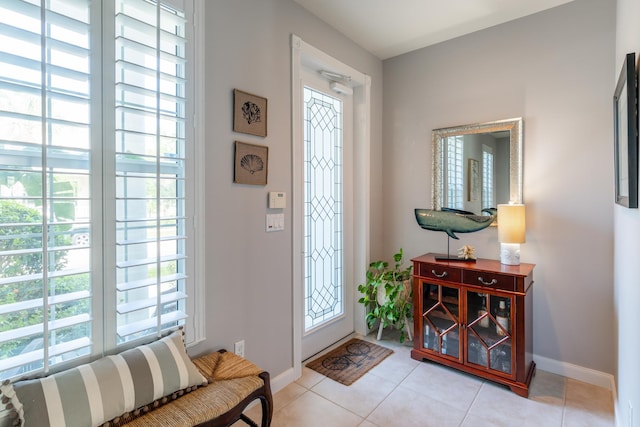 foyer with light tile patterned floors