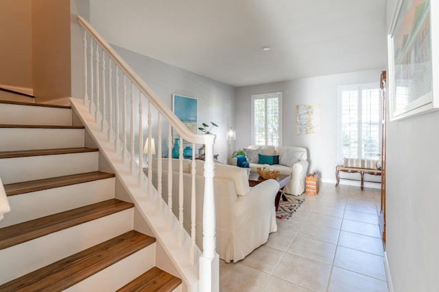 living room featuring light tile patterned floors