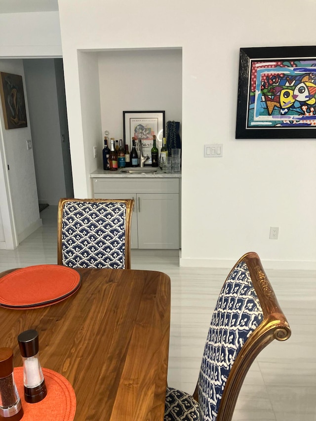 dining area featuring wet bar