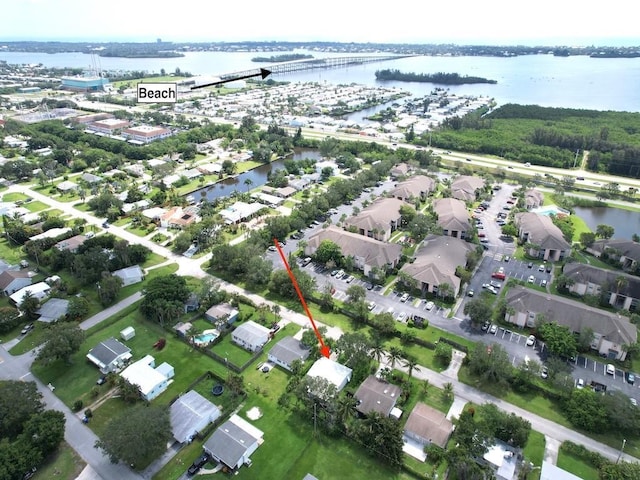 drone / aerial view with a water view