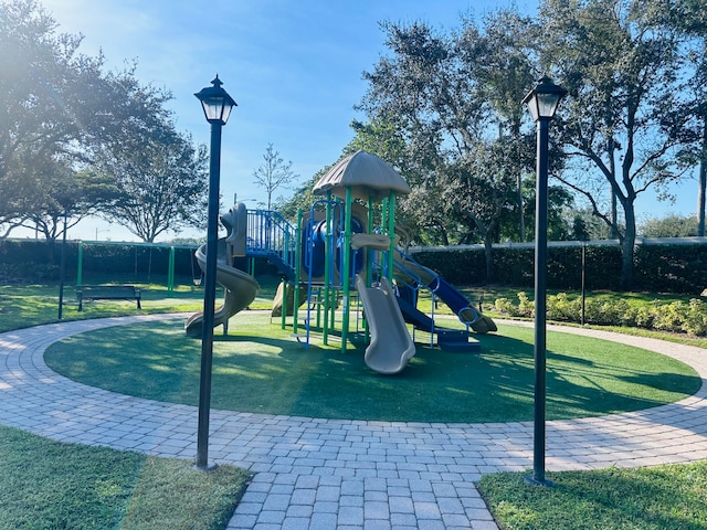 view of play area featuring a yard