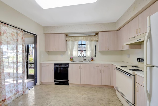 kitchen with white appliances and sink